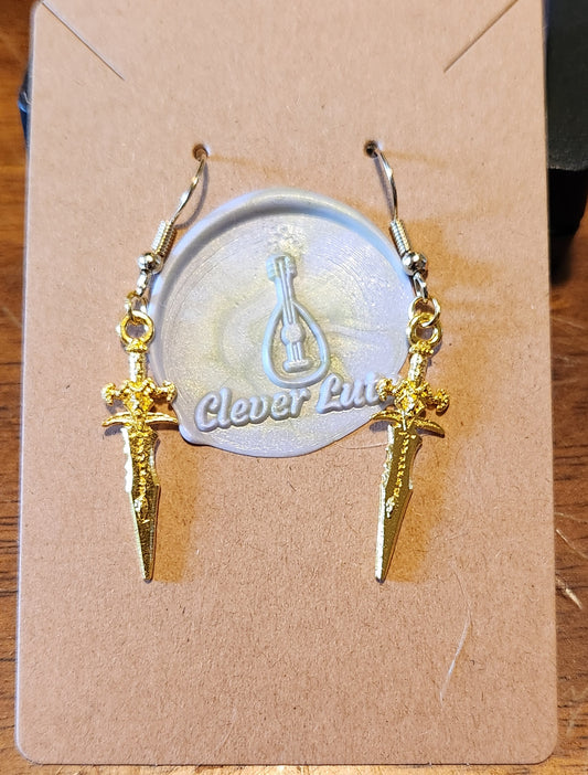 Gold dagger earrings